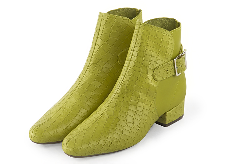 Women's pistachio green elegant ankle boots, with buckles at the back. Round toe. Low block heels - Front view
